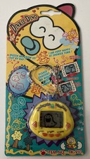 Original RakuRaku DinoKun YELLOW Dinkie Dino Electronic Virtual Pet TK-910  NEW picture