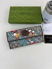 Gucci x Disney Donald Duck & Space Printed GG Supreme Flap Wallet 647828 picture