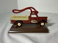 VINTAGE 2004 CAST IRON RED PICK UP TRUCK CHESTNUT CREEK NUT CRACKER  picture