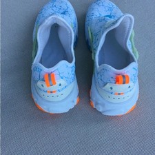Nike Youth Light Blue Marble Slip-Ons with Neon Orange Accents picture