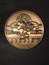 1989 MGM Studios Opening Cast Member Gift Coin Medallion on Card with Envelope picture