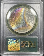 1883-O Morgan Silver Dollar $1 PCGS MS62 OGH Rainbow Toned Coin picture