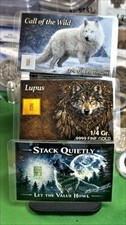 1/4 grain gold wolf. 1/4 grain platinum wolf, and 1 grain silver. picture