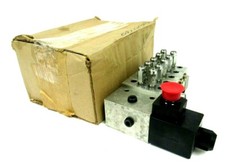 NEW LUBRIQUIP 5477530 VALVE DIVIDER 5 STACK 24V picture