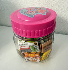 Mixed Mini Toys & Collectibles Lot in Clear Jar, Pink Lid, Disney picture