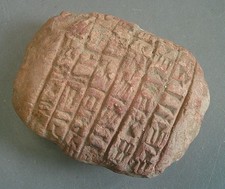 Near Eastern terracotta tablet with early form of writing picture