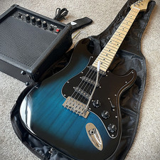 Blue Electric Guitar Starter Package with 20-Watt Amp and Accessories Full-Size picture