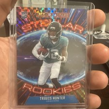 2025 Panini Rookies and Stars Travis Hunter Stellar Rollies Red Plaid picture