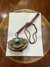 Tibetan Purse Pouch Hanging From A Red Leather Strap With Turquoise Color Stone picture