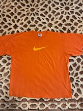 Orange Vintage Nike tee with yellow swoosh nike picture