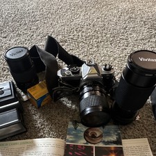 Nikon FM Silver 35mm SLR Film Camera Body with Vivitar Lenses Bundle picture
