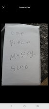 ONE PIECE GRADED MYSTERY SLAB. SLABS ARE GRADED 9 TO 10 picture