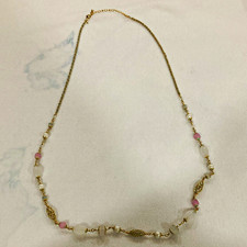 Lot of two vintage jewelry pieces. Vintage gold-tone Avon and glass bracelet. picture