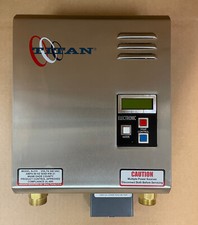 Reconditioned Titan SCR-4 N-210 tankless water heater. Free same day shipping picture