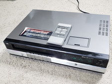 Vintage GE General Electric VCR 1VCR6012X WITH REMOTE *AS IS* POWERS ON picture