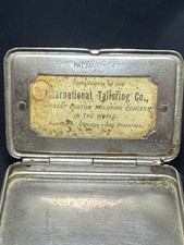 Antique 1904 International Tailoring Co Advertising Match Safe Vesta Case Lion picture
