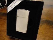 HIGH POLISH SILVER PLATE MODEL 1000 SLIM ZIPPO LIGHTER MINT IN BOX 1995 picture