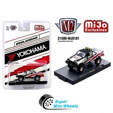 M2 Machines 1:64 1985 Toyota 4×4 Off-Road Pickup Yokohama Geolandar – White picture
