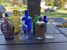 Lot Of 9 Vintage Cobalt, Green, Gold , Purple, Clear Poison / Apothecary Bottles picture