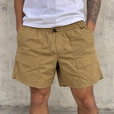 REI Co-op men's lightweight cargo/hiking shorts in tan/khaki. Relaxed outdoor picture