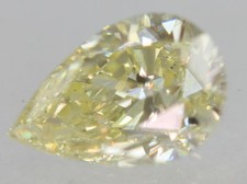 Cert 0.78 Carat Fancy Yellow VVS2 Pear Shape Natural Enhanced Diamond 7.5x5.05mm picture
