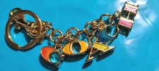 New Without Tag  C-O-A-C-H Lettered Multi-colored Enamel Gold Plated Keychain Or picture