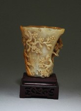 Chinese Carved Shoushan Cup. Comes fitted with a wooden stand picture