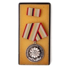 Authentic East German Interior Ministry Silver Merit Medal with Ribbon picture