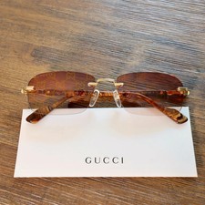 Gucci GG1221S 004 56mm Rectangle Sunglasses in Gold/Brown GG Logo Lens picture