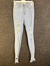 Vibrant Woman’s Size 9 Light Blue Ripped Skinny Jeans picture