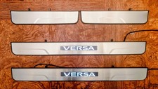 Nissan Versa/Nissan Almera 2020-2025 Genuine OEM Illuminated Door Sills 4pcs Set picture