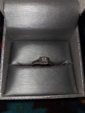 Zales 1/4 CT. T.W. Quad Princess-Cut Diamond Frame Bridal Set in Sterling Silver picture