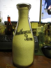 Lansing, Mich. Heatherwood Farms TRPQ Milk Bottle Golden Guernsey Jug MICHIGAN picture