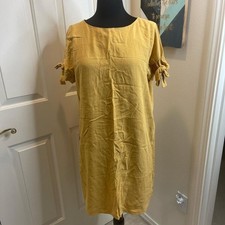 Lulus mustard dress with button up back picture