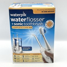NEW Waterpik Complete Care 5.0 Water Flosser + Sonic Electric Toothbrush WP-871W picture