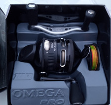 new in box ZEBCO OMEGA PRO 3 Z03PRO 3.4:1 W/10LB LINE 7 BEARING SPINCAST REEL picture