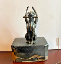 Vintage Bronze sculpture of a winged cheetah holding a rod, gold/black marble picture