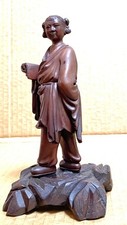 LAN CAIHE, CHINESE IMMORTAL, VINTAGE HAND CARVED WOOD FIGURINE ON BASE, CHINA picture