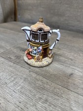 Vintage Hometown Teapot Cottage “Merry go round toys” 4.5” tall picture