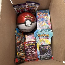 POKÉMON LOVER TIER MYSTERY BOX 📦 MULTIPLE ITEMS/GREAT GIFT FOR THE HOLIDAYS🎁 picture