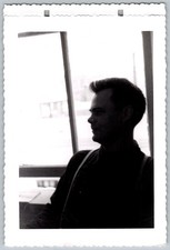 Vtg B&W Snapshot Man Silhouette Indoors Stylish Hair 1950s picture