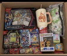 POKÉMON LOVER TIER MYSTERY BOX 📦 MULTIPLE ITEMS/GREAT GIFT FOR THE HOLIDAYS🎁 picture