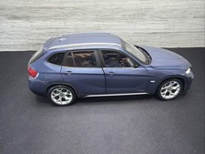 BMW X1 E84, 1:18 Scale Die-Cast Mode Blue , Kyosho  Mirror Damage No Box picture