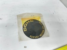 1977-1980 Suzuki GS 550 New Old Stock Ignition Emblem Cover 68235-47100 picture