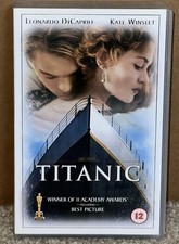 Titanic - Leonardo DiCaprio & Kate Winslet. W/Plastic Shell Casing. picture