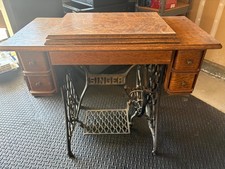 Antique Singer sewing machine - Circa 1905 - foot tread model with cabinet picture