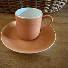 Vintage Ceramic Italy  Cup & Saucer. Glossy Peach/Apricot Glaze w/White picture