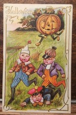 Antique 1909 Embossed Halloween Postcard Jack-O-Lantern Man Chasing Scared Boys picture