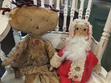 primitive 21 inch doll and 16 inch santa mix picture