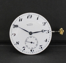 Antique Moeris manual Movement, dial, hands, winding stem & crown . Running picture